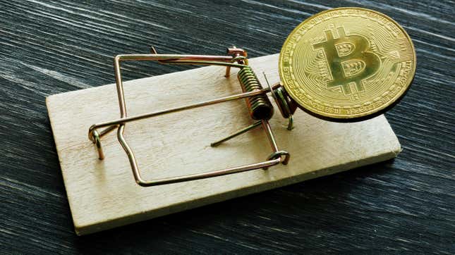 Stock image of bitcoin on mousetrap