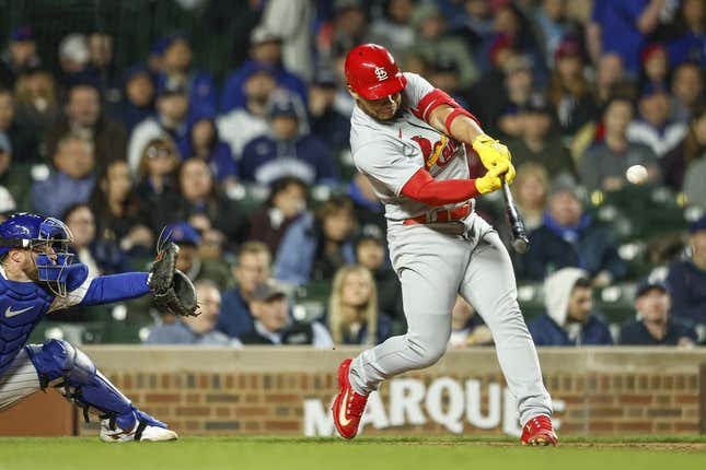 May 8, 2023; Chicago, Illinois, USA; St. Louis Cardinals catcher Willson Contreras (40) hits an RBI-double against the Chicago Cubs during sixth inning at Wrigley Field.