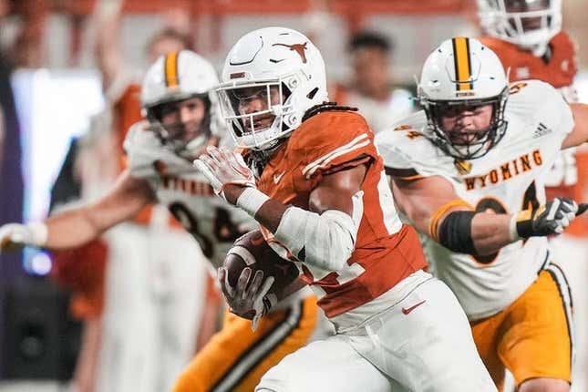 Texas Longhorns running back Jonathon Brooks (24) runs the ball forward during the Texas Longhorns' game against the Wyoming Cowboys, Saturday, Sept. 16 at Darrell K Royal Texas Memorial Stadium in Austin.