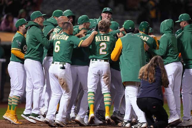 May 12, 2023; Oakland, California, USA; Oakland Athletics players celebrate at home plate after defeating the Texas Rangers at Oakland-Alameda County Coliseum.