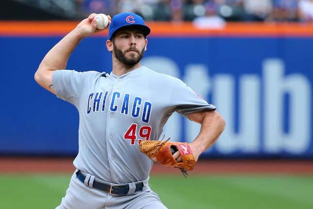 Aug 17, 2014; New York, NY, USA; Chicago Cubs starting pitcher Jake Arrieta (49) pitches during the first inning against the New York Mets at Citi Field. Mandatory Credit: Anthony Gruppuso-USA TODAY Sports - RTR42QL2