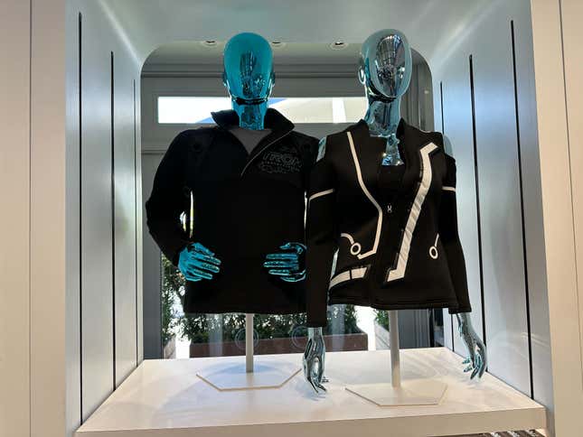 Image for article titled Tron Merch at Walt Disney World Offers Sci-Fi Fits, Retro Toys, and Custom Figures