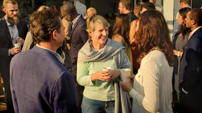 People connecting at networking event.