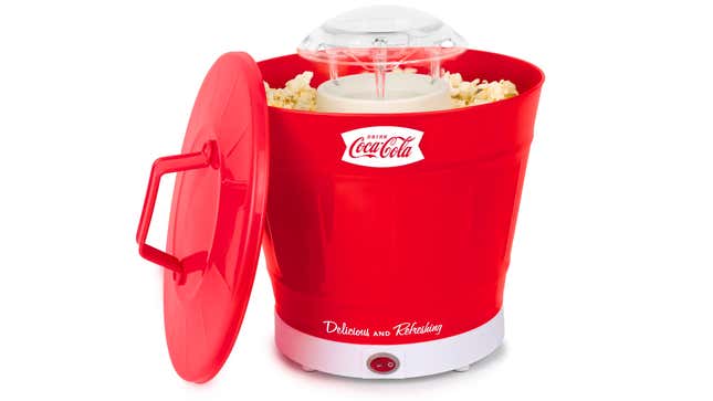 A bucket-style red hot air popper with the Coca-Cola logo on the outside.