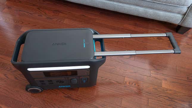 An overhead shot of the Anker PowerHouse 767 Portable Power Station with its suitcase-like collapsible handle extended.