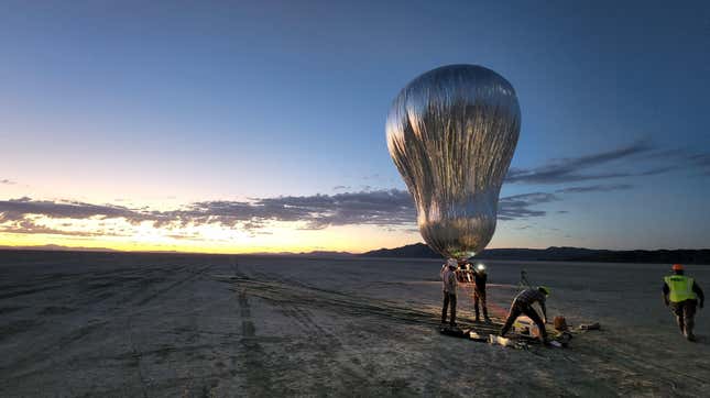 A prototype aerial robotic balloon, or aerobot, is readied for a sunrise test flight at Black Rock Desert, Nevada, in July 2022, by team members from JPL and Near Space Corporation. 