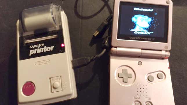 An image from Twitter user DerrickMustDie of a pink Game Boy Advance SP hooked up to a Game Boy Printer, with the printer copying a Bored Ape NFT.