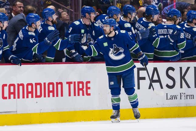 Mar 23, 2023; Vancouver, British Columbia, CAN; Vancouver Canucks forward Conor Garland (8) celebrates his goal against the San Jose Sharks in the second period at Rogers Arena.