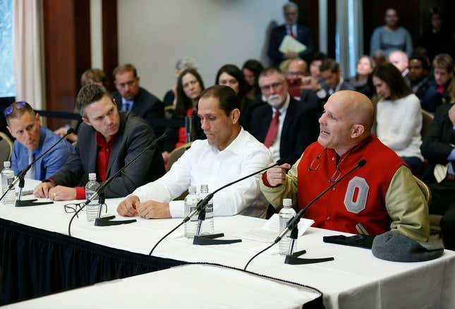 Victims of former Ohio State team doctor Dr. Richard Strauss, Michael DiSabato, from right, with Mike Schyck, Brian Garrett and Stephen Snyder Hill, speak during an Ohio State University Board of Trustees meeting at the Longaberger Alumni House in Columbus, Ohio in November 2018.