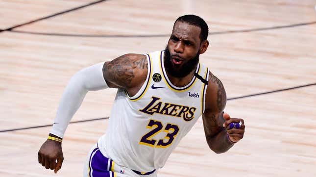 A photo of LeBron James running in a game. James declined to pay Elon Musk $8 to keep his blue verified checkmark.