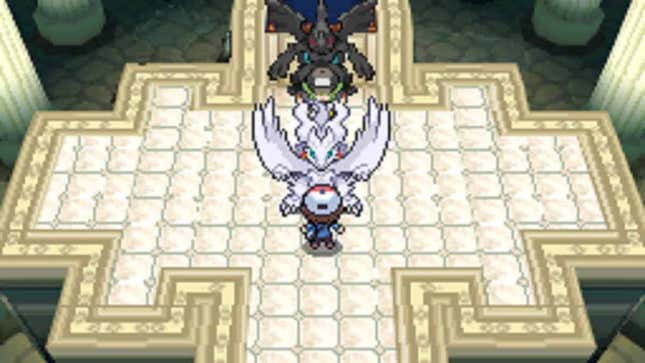 A Pokémon trainer is seen confronting N with Reshiram and Zekrom.