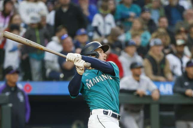 Apr 14, 2023; Seattle, Washington, USA; Seattle Mariners left fielder Jarred Kelenic (10) watches after hitting a two-run home run against the Colorado Rockies during the second inning at T-Mobile Park.