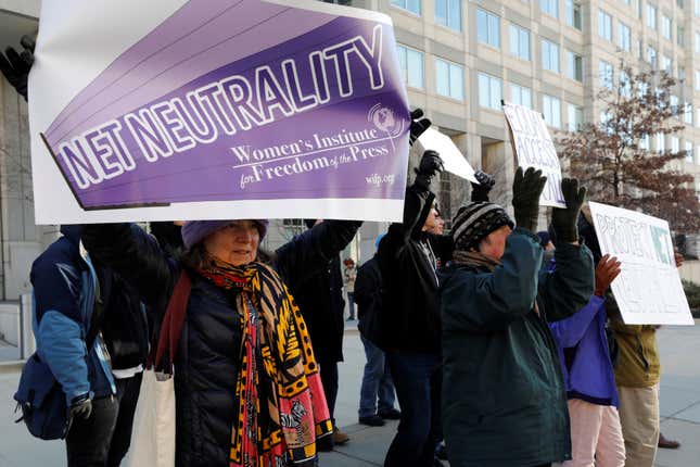 Net-neutrality advocates rally in front of the Federal Communications Commission offices in Washington D.C., Dec. 13, 2017.