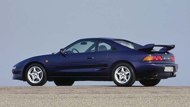 A photo of a blue Toyota MR2 from the 1990s. 