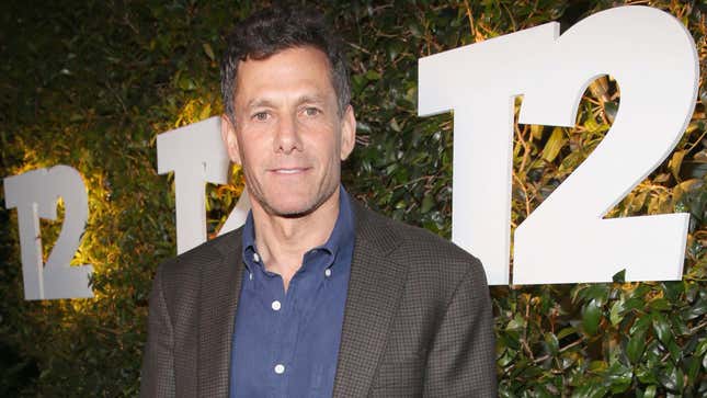 A photo of Take-Two CEO Strauss Zelnick wearing a suit and smiling. 