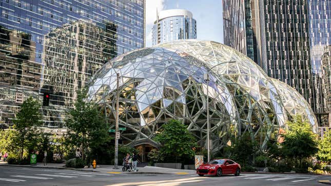 Amazon’s Seattle, WA headquarters—featuring its signature domes, called “The Spheres,” With CEO Andy Jassy’s new announcement, the company’s tech and other desk employees will have to return to this office as well as the company’s many others. 