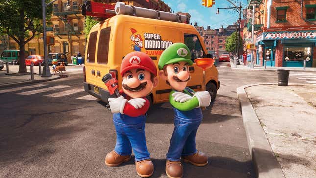 Mario and Luigi are seen standing back to back in front of the Super Mario Bros. plumbing truck.