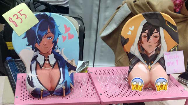 At Anime NYC a vendor sold oppai mouse pads of Kaeya and Zhongli from Genshin Impact.