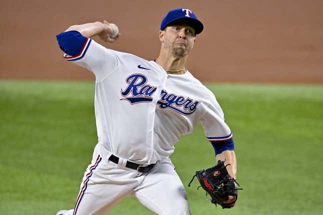 Apr 5, 2023; Arlington, Texas, USA; Texas Rangers starting pitcher Jacob deGrom (48) pitches against the Baltimore Orioles during the first inning at Globe Life Field.