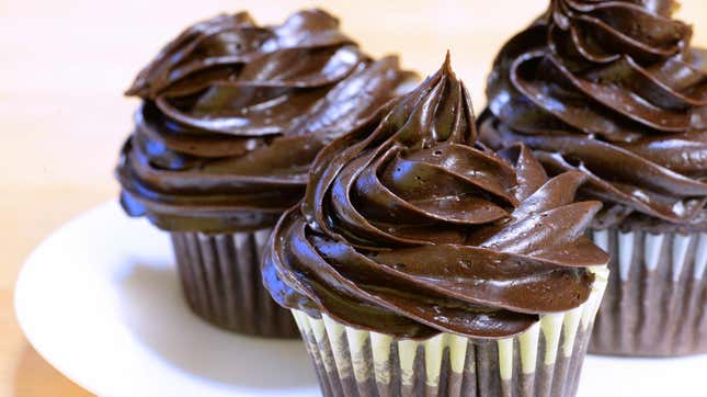 Chocolate Mayo Cupcakes with chocolate frosting on white plate