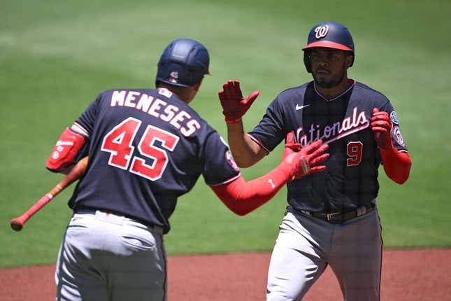 Jun 25, 2023; San Diego, California, USA; Washington Nationals third baseman Jeimer Candelario (9) is congratulated by designated hitter Joey Meneses (45) after hitting a home run against the San Diego Padres during the first inning at Petco Park.