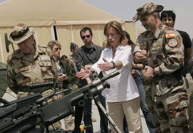 Spain's Defence Minister Carme Chacon, second right, gestures as she meets Spanish troops who are part of the International Security Assistant Force (ISAF) after she arrived in Herat province southwest of Kabul, Afghanistan