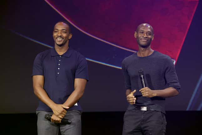 (L-R) Anthony Mackie and Julius Onah speak onstage during D23 Expo 2022 at Anaheim Convention Center in Anaheim, California on September 10, 2022. (Photo by Jesse Grant/Getty Images for Disney)