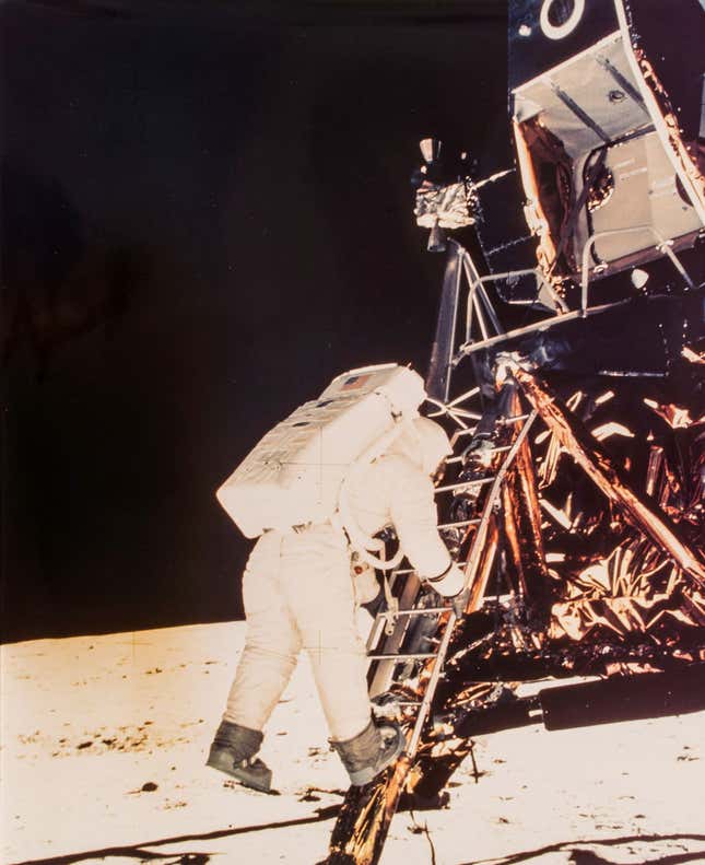 Image for article titled NASA is auctioning off the first space selfie and a trove of other incredible photos
