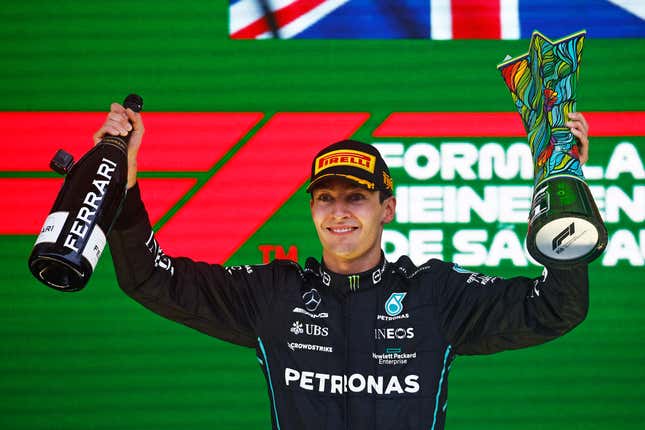 George Russell celebrates his first Formula 1 Grand Prix win at the 2022 Brazilian GP.