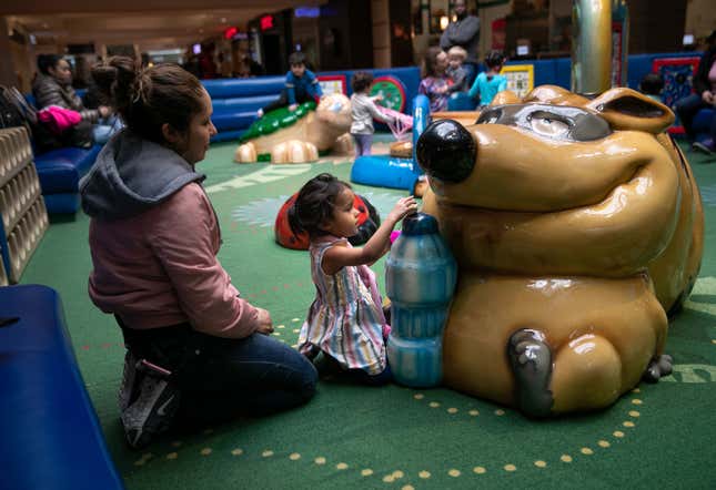 Sanchez sits with Yanela at a playground in February. At the time, Sanchez said she couldn’t afford an attorney to advocate for her and her daughter in their request for asylum.