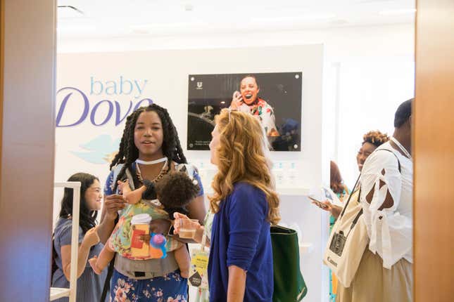 Women could get free hairstyling, beauty tips, and products for mom and baby at the Dove suite at Mom 2.0.