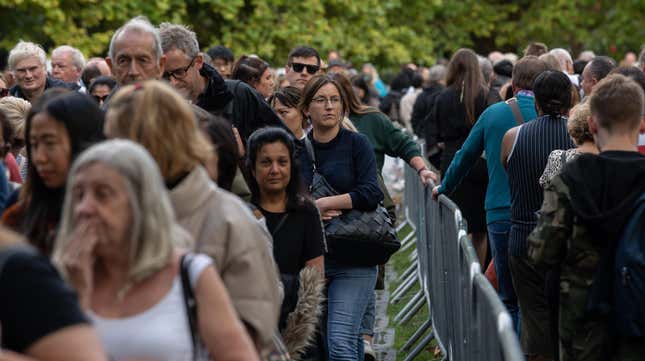 LONDON, ENGLAND - SEPTEMBER 16: Well-wishers stand in the queue in Southwark Park for the Lying-in State of Queen Elizabeth II on September 16, 2022 in London, England.