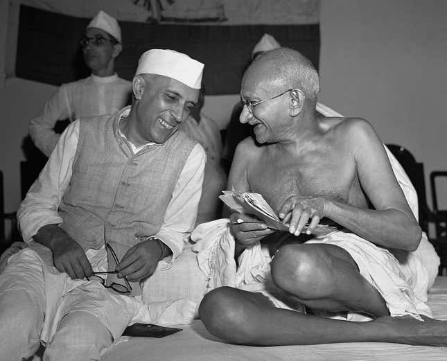 Nehru and Gandhi share a joke in Bombay (Mumbai), 1946