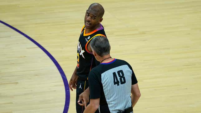 Phoenix Suns guard Chris Paul talks with referee Scott Foster during the second half of Game 2 against the Clippers.