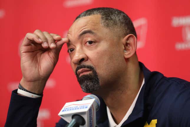 Why was Michigan's Juwan Howard suspended while Greg Gard was only fined?