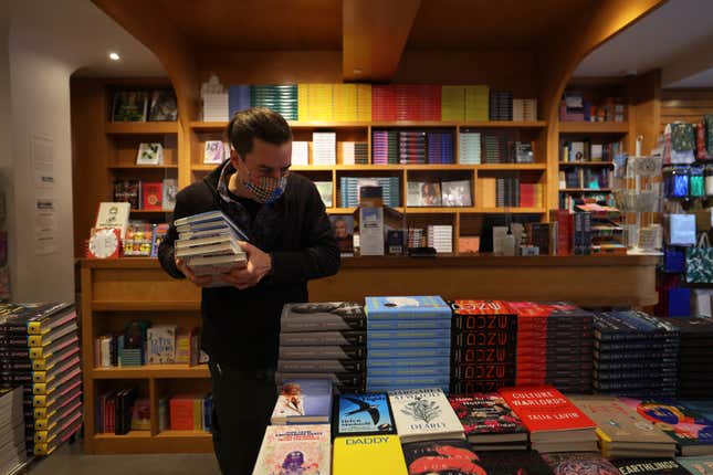NEW YORK, NEW YORK - NOVEMBER 17: Niko Tsocanos makes room for former President Barack Obama's memoir at the Greenlight Bookstore in the Flatbush neighborhood of Brooklyn on November 17, 2020 in New York City. "A Promised Land" is the first of two memoirs written by former President Obama. (Photo by Michael M. Santiago/Getty Images)