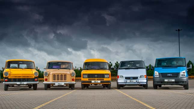 A photo of five different generations of Ford Transit van. 