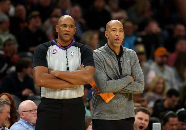 Jan 19, 2023; Phoenix, Arizona, USA; Phoenix Suns head coach Monty Williams (right) alongside NBA referee Kevin Cutler against the Brooklyn Nets at Footprint Center.
