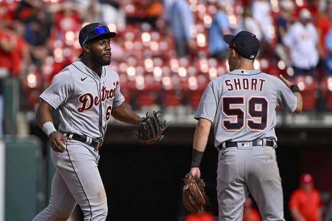 May 6, 2023; St. Louis, Missouri, USA;  Detroit Tigers left fielder Akil Baddoo (60) and shortstop Zack Short (59) celebrate after the Tigers defeated the St. Louis Cardinals in ten innings at Busch Stadium.