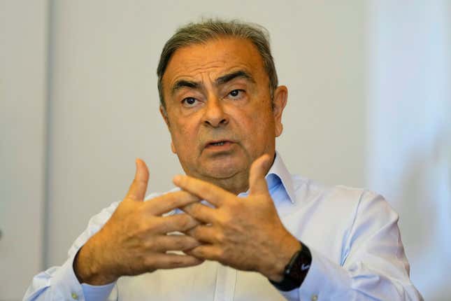 FILE - Former Nissan executive Carlos Ghosn speaks during an interview with The Associated Press in Beirut, Lebanon, on June 23, 2023. Lebanese judicial authorities have questioned two people at the request of Turkey on suspicion of being involved in the 2019 escape of auto tycoon Carlos Ghosn from Japan to Lebanon, judicial officials said Friday, Sept. 8, 2023. (AP Photo/Hassan Ammar, File)