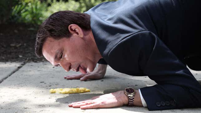 Image for article titled Ron DeSantis Holds Press Conference To Slurp Custard Off The Ground