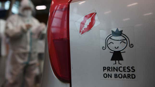 A photo of a novelty car bumper sticker. 