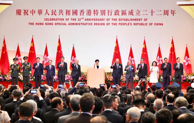 Carrie Lam, center, and Chinese officials at the ceremony.