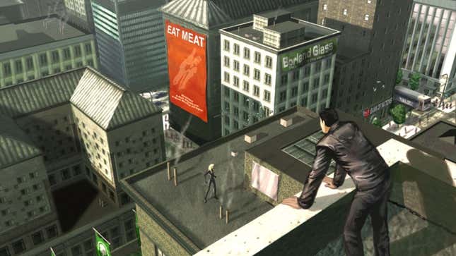 In a promotional screenshot for The Matrix Online video game, a payer looks down on the streets of the Matrix's Mega City as another character stands on a lower roof.