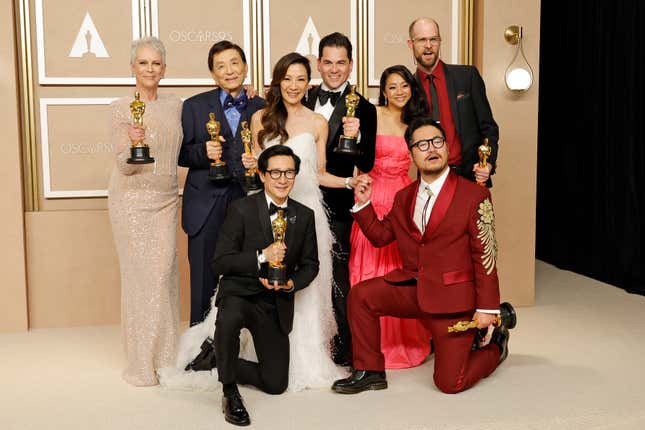 (L-R top row) Jamie Lee Curtis, winner of the Best Supporting Actress award, James Hong, Michelle Yeoh, winner of the Best Actress in a Leading Role award, Jonathan Wang, winner of the Best Picture award, Stephanie Hsu, Daniel Scheinert, winner of the Best Director and Best Picture award and (L-R bottom row) Ke Huy Quan, winner of the Best Actor In A Supporting Role award and Dan Kwan, winner of the Best Director and Best Picture award for “Everything Everywhere All at Once,” pose in the press room during the 95th Annual Academy Awards on March 12, 2023.