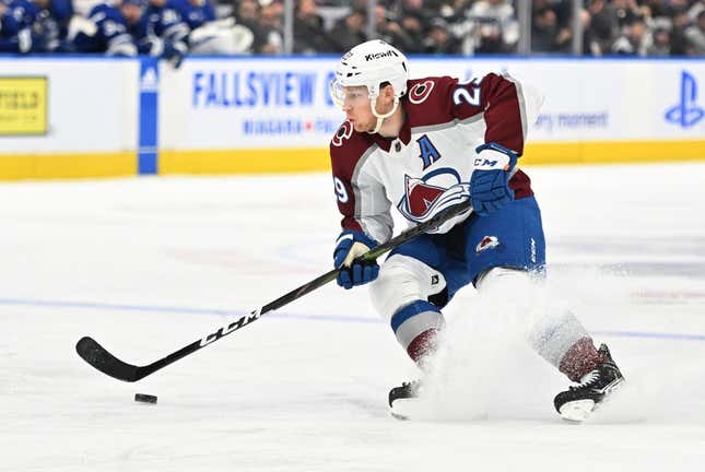 Mar 15, 2023; Toronto, Ontario, CAN;   Colorado Avalanche forward Nathan MacKinnon (29) skates with the puck against the Toronto Maple Leafs in the second period at Scotiabank Arena.
