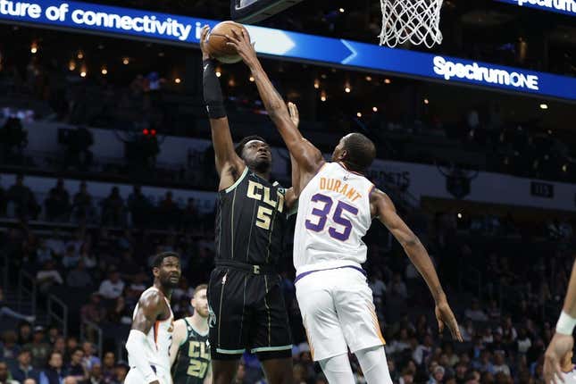 Mar 1, 2023; Charlotte, North Carolina, USA; Charlotte Hornets center Mark Williams (5) has his shot blocked by Phoenix Suns forward Kevin Durant (35) during first half action at Spectrum Center.