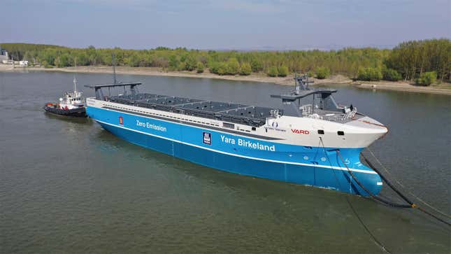 A photo of a Yara container ship with no bridge. 