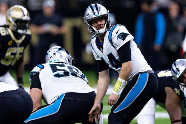 Jan 8, 2023; New Orleans, Louisiana, USA;  Carolina Panthers quarterback Sam Darnold (14) drops back to pass against the New Orleans Saints during the first half at Caesars Superdome.