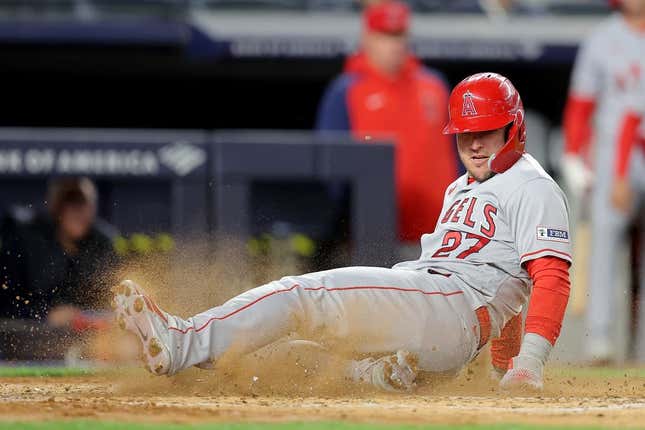 Apr 18, 2023; Bronx, New York, USA; Los Angeles Angels center fielder Mike Trout (27) scores a run against the New York Yankees on a single by third baseman Anthony Rendon (not pictured) during the fourth inning at Yankee Stadium.